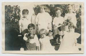 Primary view of object titled '[Photograph of Mert Colgin and 8 Children]'.