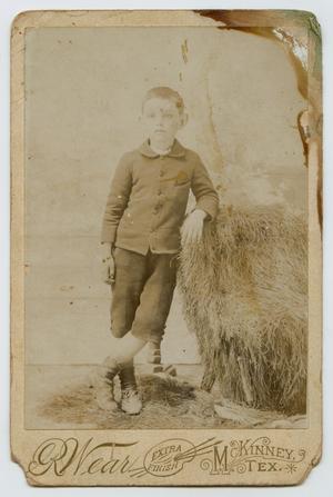 Primary view of object titled '[Portrait of a Boy Leaning on Hay]'.