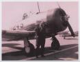 Photograph: [Brown in Front of Plane]