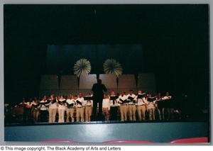 Primary view of object titled '[Christmas/Kwanzaa Concert Photograph UNTA_AR0797-136-08-23]'.