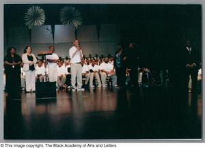 Primary view of object titled '[Christmas/Kwanzaa Concert Photograph UNTA_AR0797-136-08-12]'.