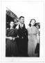 Photograph: [Man and two woman]