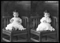 Photograph: [Child Sitting in Corner of Chair]