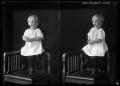 Photograph: [Young Boy Standing on Chair]